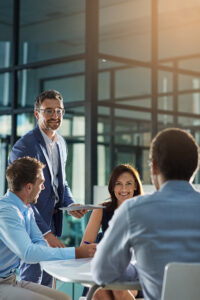 Leader, feedback or business people with tablet for planning, investment research or budget advice. Teamwork, manager and financial advisor in discussion for accounting review, meeting and report
