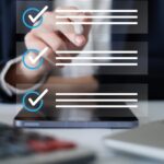 Professional entrepreneur businessman working in office check checklist form document report checkbox questionnaire task to-do list survey choice management quality control concept