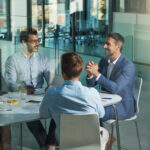 Business people, meeting and discussion for corporate planning, strategy or brainstorming at the office. Group of employee workers in business meeting, team planning or collaboration at the workplace